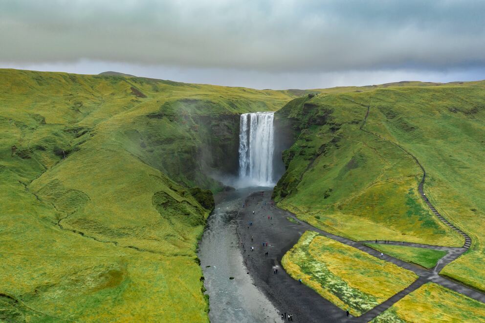 A beautful waterfall among green hills.